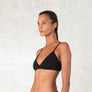 Organic cotton triangle bra with adjustable spaghetti straps. Breathable, wireless. Ideal for yoga, pilates, gym, or daily athleisure wear. Provides light support.
