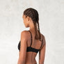 Organic cotton triangle bra with adjustable spaghetti straps. Breathable, wireless. Ideal for yoga, pilates, gym, or daily athleisure wear. Provides light support.