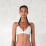 Organic cotton triangle bra with adjustable spaghetti straps. Breathable, wireless. Ideal for yoga, pilates, gym, or daily athleisure wear. Provides light support.