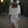 Long maxi dress made of very soft natural, breathable fiber. With a cowl neck piece that converts into a hood or a shawl. A wardrobe staple. Slow and sustainable fashion.
