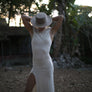 Long maxi dress made of very soft natural, breathable fiber. With a cowl neck piece that converts into a hood or a shawl. A wardrobe staple. Slow and sustainable fashion.