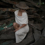 Long maxi dress made of very soft, natural, breathable fiber. With a cowl neck piece that converts into a hood or a shawl. A wardrobe staple. Slow and sustainable fashion.