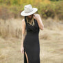 Long maxi dress made of very soft, natural, breathable fiber. With a cowl neck piece that converts into a hood or a shawl. A wardrobe staple. Slow and sustainable fashion.