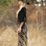 Long maxi dress made of very soft, natural, breathable fiber. With a cowl neck piece that converts into a hood or a shawl. A wardrobe staple. Slow and sustainable fashion.