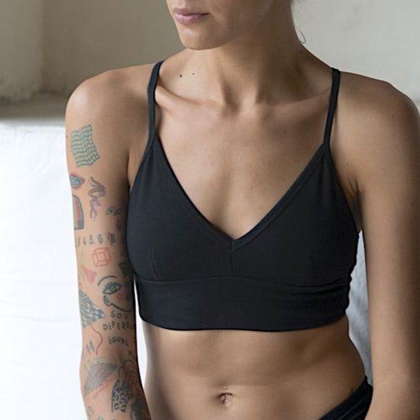 Organic cotton crisscross bra. Ideal for yoga, pilates, gym, or daily athleisure wear. Provides light support. Breathable, wireless, fully lined with adjustable, convertible straps.